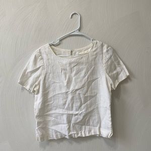 white, somewhat cropped shirt